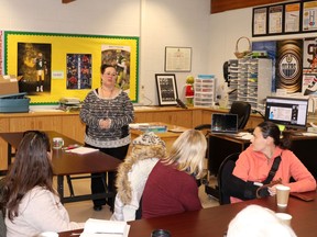 Sangudo Principal Sherry Pfannmuller spoke to community members Tuesday night regarding how to keep the school open.