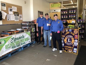 Photo by CHLOE KNEER
Lions Ted Petrus, Brian Cairns and Mike Dubrieul handed out "menus," with a list of items that the Espanola Helping Hand Food Bank is in need of, to shoppers at Freshco on Friday, May 6. The annual Espanola Lions Food Bank Drive returned after a two-year absence.