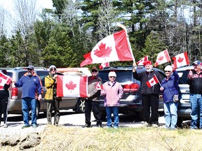 Photo by KEVIN McSHEFFREY
A group of Elliot Lake residents celebrated freedom in Canada by having a rally down to Highway 17 on April 30.