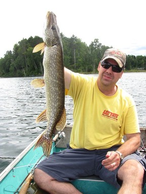 The author with a nice northern pike he caught at Logosland in Cobden.