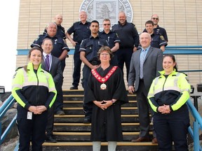 Members of the County of Renfrew Paramedic Service were recognized at the May 25 Renfrew County Council meeting, as it occurred during Paramedic Services Week. Taking time to honour the paramedics were Warden Debbie Robinson (front centre); Chief Administrative Officer Paul Moreau (second row left); Councillor Michael Donahue, Health Committee chairman (second row right) and (back from left) Commander Dave Libby, Deputy Chief-Logistics Brian Leahey, Chief Michael Nolan and Deputy Chief Mathieu Grenier (third row right).