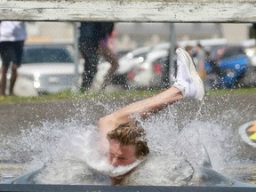 St. Marys DCVI's Ezra Bender dominated the Huron-Perth open boys' 2,000-metre steeplechase event Tuesday in Clinton, and he made a splash by falling into a pit of water along the way.