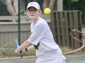 Stratford District secondary school's Felicity Sibold returns a shot during the WOSSAA tennis championships Friday at the Stratford Tennis Club. Sibold finished third in girls' singles and qualified for OFSAA.