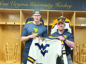 Iron Bridge native Shane Buckley (right) welcomes new recruit Michael Nickolau to West Virginia. The 32-year-old Buckley is the head coach of the West Virginia University Mountaineers of the American Collegiate Hockey Association. As for Nickolau, the 20-year-old goalie is a recent graduate of the Cochrane Crunch of the Northern Ontario Jr. Hockey League. HOCKEY NEWS NORTH