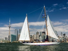 HMCS Oriole sails past the Toronto skyline in 2018 in this photo by Master Corporal (MCpl) Neil Clarkson.