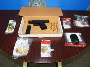 Sarnia police say they're searching for a suspect from Toronto after they found nearly $12,000 in fentanyl, a loaded handgun, and ammo in a trap door of a car on May 11, 2022. (Sarnia police)