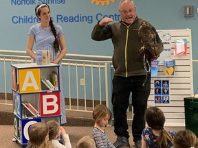 Jennifer Pool, author of The Enchanted People, was joined by James Cowan, director of the Canadian Raptor Conservancy, in educating children and parents on bird facts during a recent book reading event at the Norfolk County Public Library Simcoe Branch. ALEX HUNT