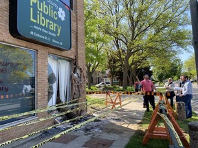 Library and engineering officials survey the damage caused after a driver crashed into the Simcoe branch of the Norfolk County Public Library on Talbot Street South. The collision occurred at about 11:45 p.m. on Monday, May 23. Norfolk OPP say a 33-year-old Ohsweken resident has been charged with impaired driving offences in relation to the crash. SIMCOE REFORMER