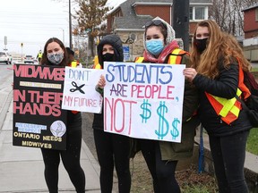 Protesters take part in a rally to fight Laurentian University program closures in Sudbury, Ont. on Friday April 16, 2021. John Lappa/Sudbury Star/Postmedia Network