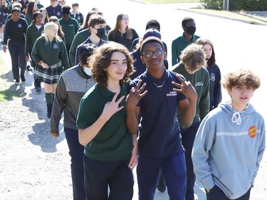 St Benedict Catholic Secondary School students and staff take part in a Water Walk in Sudbury, Ont. on Thursday May 5, 2022. The Diversity Club at the school organized the event with Indigenous support lead Shannon Agowissa. The walk, which was held during Mental Health Week, was also held to recognize National Day of Awareness for Missing and Murdered Indigenous Women, Girls and Two-Spirit people. John Lappa/Sudbury Star/Postmedia Network