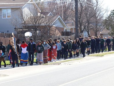 St Benedict Catholic Secondary School students and staff take part in a Water Walk in Sudbury, Ont. on Thursday May 5, 2022. The Diversity Club at the school organized the event with Indigenous support lead Shannon Agowissa. The walk, which was held during Mental Health Week, was also held to recognize National Day of Awareness for Missing and Murdered Indigenous Women, Girls and Two-Spirit people. John Lappa/Sudbury Star/Postmedia Network