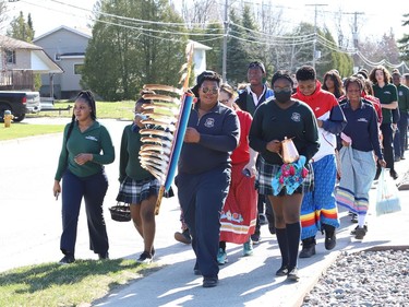 St Benedict Catholic Secondary School students and staff take part in a Water Walk in Sudbury, Ont. on Thursday May 5, 2022. The Diversity Club at the school organized the event with Indigenous support lead Shannon Agowissa. The walk, which was held during Mental Health Week, was also held to recognize National Day of Awareness for Missing and Murdered Indigenous Women, Girls and Two-Spirit people. John Lappa/Sudbury Star/Postmedia Network