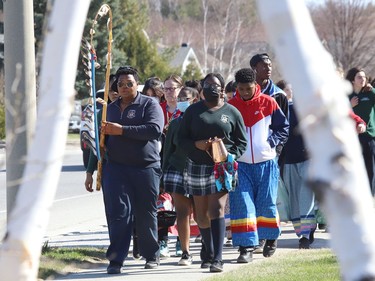 St Benedict Catholic Secondary School students and staff take part in a Water Walk in Sudbury, Ont. on Thursday May 5, 2022. The Diversity Club at the school organized the event with Indigenous support lead Shannon Agowissa. The walk, which was held during Mental Health Week, was also held to recognize National Day of Awareness for Missing and Murdered Indigenous Women, Girls and Two-Spirit people. John Lappa/Sudbury Star/Postmedia Network