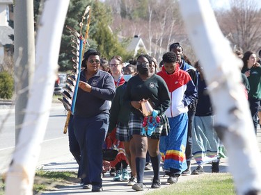 St Benedict Catholic Secondary School students and staff take part in a Water Walk in Sudbury, Ont. on Thursday May 5, 2022. The Diversity Club at the school organized the event with Indigenous support lead Shannon Agowissa. The walk, which was held during Mental Health Week, was also held to recognize National Day of Awareness for Missing and Murdered Indigenous Women, Girls and Two-Spirit people. John Lappa/Sudbury Star/Postmedia Network