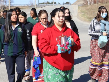 St Benedict Catholic Secondary School students and staff take part in a Water Walk in Sudbury, Ont. on Thursday May 5, 2022. The Diversity Club at the school organized the event with Indigenous support lead Shannon Agowissa. The walk, which was held during Mental Health Week, was also held to recognize National Day of Awareness for Missing and Murdered Indigenous Women, Girls and Two-Spirit people. John Lappa/Sudbury Star/Postmedia Network