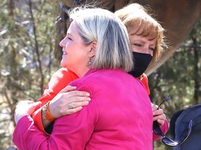 Ontario NDP leader Andrea Horwath, left, and Nickel Belt NDP candidate France Gelinas hug during a campaign stop in Sudbury, Ont. on Monday May 9, 2022. John Lappa/Sudbury Star/Postmedia Network