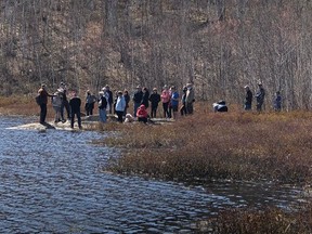 Candidates and community members learn about the unique Bennett Lake watershed in the LU greenspace, on a spring walk led by Dr. Peter Beckett, May 7. Supplied