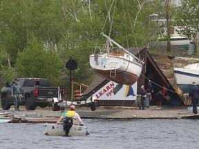 A crane is used to place a sailboat in the water at the Sudbury Yacht Club on Ramsey Lake. Tuesday will be cloudy with a high of 16 C. John Lappa/Sudbury Star