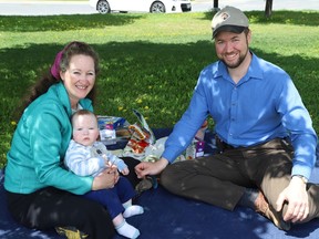 Sherrill and Andrew Wilson have a picnic with their seven-month-old son Frederick, at Bell Park in Sudbury, Ont. on Tuesday May 24, 2022.Wednesday will be cloudy with a high of 19 degrees C.  John Lappa/Sudbury Star/Postmedia Network