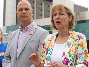 Nickel Belt NDP candidate France Gelinas makes a point as Sudbury NDP candidate Jamie West looks on at a press conference near Health Sciences North in Sudbury, Ont. on Monday May 30, 2022. John Lappa/Sudbury Star/Postmedia Network