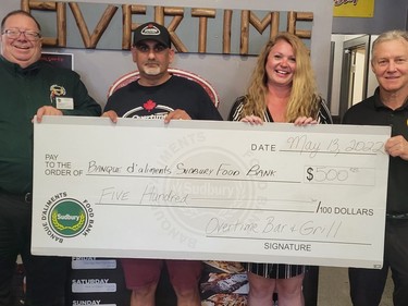 A cheque presentation from a hospitality event at Overtime Sports Bar and Grill was held with the Sudbury Five in support of the Sudbury Food Bank. Participating were Dan Xilon, Sudbury Food Bank (left); Attilio Langella, Overtime Sports Bar and Grill; Jana Schilkie, Jana Hospitality Consulting; and Bob Johnston, The Sudbury Five. Supplied