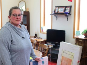 Giving Hope Thrift Store & More's Lisa Holmes stands inside the new Watford shop, which opened April 30. Carl Hnatyshyn/Sarnia This Week