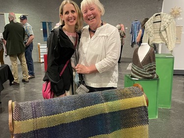 Natalie Ginglo-Robert and her mother, Peggy Ginglo, with the wool blanket that Peggy crafted for her daughter. Mother and daughter finished the blanket together, a process that involves putting the blanket through warm and cold bath cycles, drying and brushing, to make the stitches open and bloom. "Every time I'll use the blanket I'll think of her," said Ginglo-Robert.  "This won't just be a warm blanket, but will also be warm in a sentimental way."

NICOLE STOFFMAN/The Daily Press