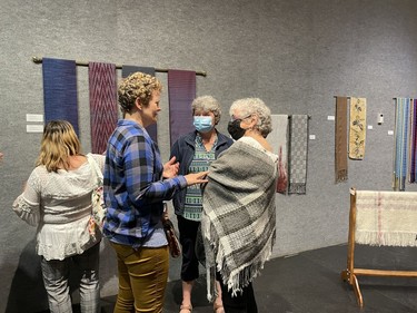 A total of 61 people attended Thursday's opening of "A Treasury of Textiles, Celebrating the Porcupine Handweavers and Spinners Guild's 45th Anniversary.  Karen Bachman, director and curator of the Timmins Museum, called handwoven towels, blankets and shawls a true art form that permeates our everyday lives. She took the opportunity to thank women over the decades for "all the art you've done forever."  The exhibit runs until May 31. Admission is free.

NICOLE STOFFMAN/The Daily Press