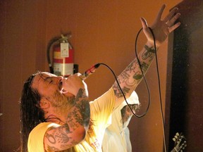 Liam Cormier, lead singer of Toronto-based hardcore punk band Cancer Bats, performs on Saturday night at The Victory Tavern in Timmins. 

ANDREW AUTIO/The Daily Press