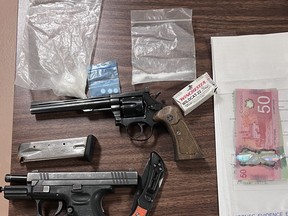 RCMP recover firearms and drugs during arrest in Winnipeg. RCMP Photo