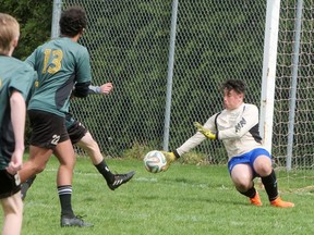Simcoe Composite goalie Ethan DeLong makes a first-half save Friday during the Gemini Cup playing against host Glendale HS. CHRIS ABBOTT/Norfolk and Tillsonburg News