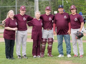 Participating in the Sam Lamb Tribute Night first pitch ceremony are Kelly Springer, Owen Harris, Mary Anne Van Geertruyde, Travis Lamb, Terry Lamb and Brandon Balazs. CHRIS ABBOTT