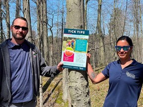 Southwestern Public Health and Catfish Creek Conservation Authority staff were hanging "tick tips" posters in Malahide Township. Submitted photo