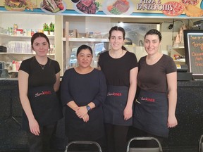 Ravy Keo (second from left) has been the owner of Sam's Diner in West Lorne for three years. She's shown with her staff. Larry Schneider photo