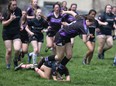 Jaclyn Biernes drives forward as the Owen Sound District Wolves topped St. Mary's 42-0 on May 11, 2022, at OSDSS in Bluewater Athletic Association senior girls rugby action. Greg Cowan/The Sun Times
