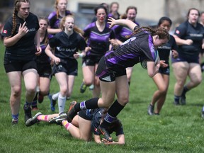 Jaclyn Biernes drives forward as the Owen Sound District Wolves topped St. Mary's 42-0 on May 11, 2022, at OSDSS in Bluewater Athletic Association senior girls rugby action. Greg Cowan/The Sun Times