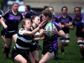 The Owen Sound District Wolves shut out the Grey Highlands Lions 35-0 Monday afternoon at OSDSS to win the Bluewater Athletic Association senior girls rugby championship and cap off another undefeated season. Greg Cowan/The Sun Times