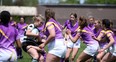 A Grey Highlands Lions ball carrier is surrounded by a sea of purple jerseys worn by the Centre Dufferin District High School Royals who won the CWOSSA A/AA girls rugby championship Tuesday in Owen Sound with a 22-12 win over the Grey Highlands Lions. Both teams have earned berths into the 2022 OFSAA A/AA girls rugby provincial championship in Cobourg May 30 to June 1. Greg Cowan/The Sun Times