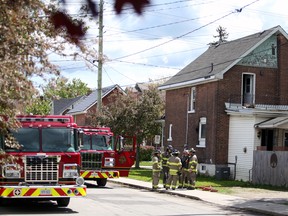 Owen Sound firefighters at the scene of a house fire Monday near 11th and 2nd Avenue West. Firefighters responded to the fire Monday morning just before 10 a.m., and were on the scene until the early afternoon. Greg Cowan/The Sun Times