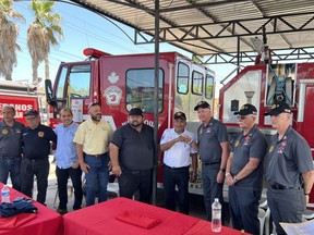 Volunteers including Brian Wynn and Bill McAree presented Whitecourt’s Engine 3 to Mazatlan’s modest firehall, with the ceremonial handing over of the key.