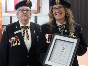 First vice-president of the Royal Canadian legion Alberta-NWT Ladies Auxiliary Command Barb Burnett presented Royal Canadian Legion Br. No. 86 Ladies Auxilary president Janice Drader Jamieson with a certificate commemorating the branch's 75th Anniversary Saturday.
Christina Max