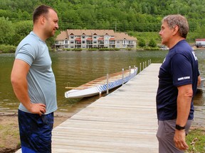 North Bay Canoe Club head coach Mihail Oghina, left, and Bernie Vierich, commodore of the club, discuss plans to replace the club's dock on Trout Lake, Wednesday. The club is hosting a regatta June 18.
PJ Wilson/The Nugget