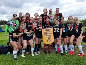 Players from the Ecole secondaire catholique l'Horizon Aigles celebrate winning the NOSSA Open Girls A championship in Lively, Ontario on Friday, May 27, 2022. L'Horizon is one of several local teams and athletes representing the SDSSAA at OFSAA this spring.