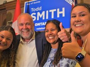Minutes after Ontario election projections Thursday evening that incumbent Todd Smith was being returned by large margin as Bay of Quinte MPP, (from left) his daughter Reagan, wife Tawnya and daughter Payton were jubilant their dad and 11-year Queen's Park representative was re-elected by voters for a fourth term in office. DEREK BALDWIN