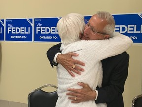 Progressive Conservative MPP-elect Vic Fedeli hugs his mother Lena Fedeli Thursday night after walking into the Davedi Club with his wife Patty Fedeli.