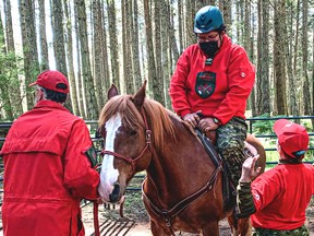 Master Cpl. Leo Oskineegish, of Nibinamik, mounts a horse for the first time during a training exercise held by the Canadian Rangers in celebration of the organization’s 75th anniversary. Rangers from five Northern Ontario First Nations took part in the event. WARRANT OFFICER TERRY AFFLICK/CANADIAN RANGERS
