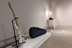 The Dad Club exhibition at Gallery Stratford combines Sculptor Ross Bell’s minimalist style with artist Jason McLean’s colourful, funky and freeform paintings and drawings. Pictured, the Stratfordcastor, a guitar built by Bell and painted by McLean, celebrates some of Stratford’s musical legacies. (Galen Simmons/The Beacon Herald)