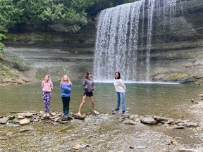 International students staying in Sudbury visit Bridal Veil Falls on Manitoulin Island.