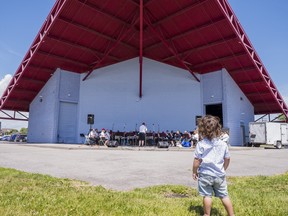 1-and-a-half year old Toa Teutau enjoys music from the Trenton Citizens Band inside the newly renamed Bob Wannamaker Amphitheatre, named after Teutau's Great Grandfather. Sunday in Quinte West. ALEX FILIPE