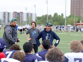 Sudbury Junior Spartans head coach Jordan Desilets speaks to his players during a practice at James Jerome Sports Complex in Sudbury, Ontario on Wednesday, May 26, 2022.